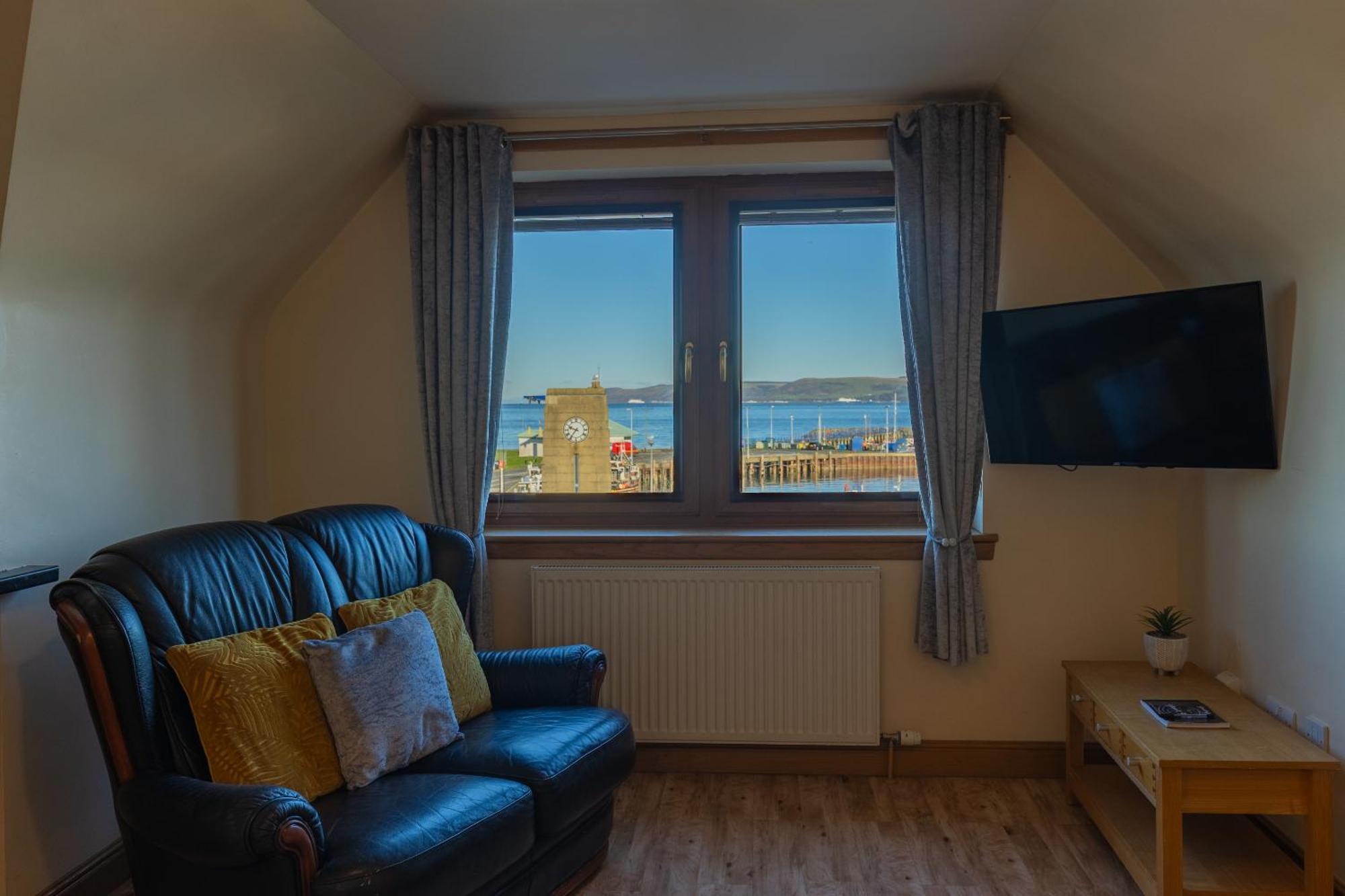 Quay Head View Aparthotel Странрер Стая снимка