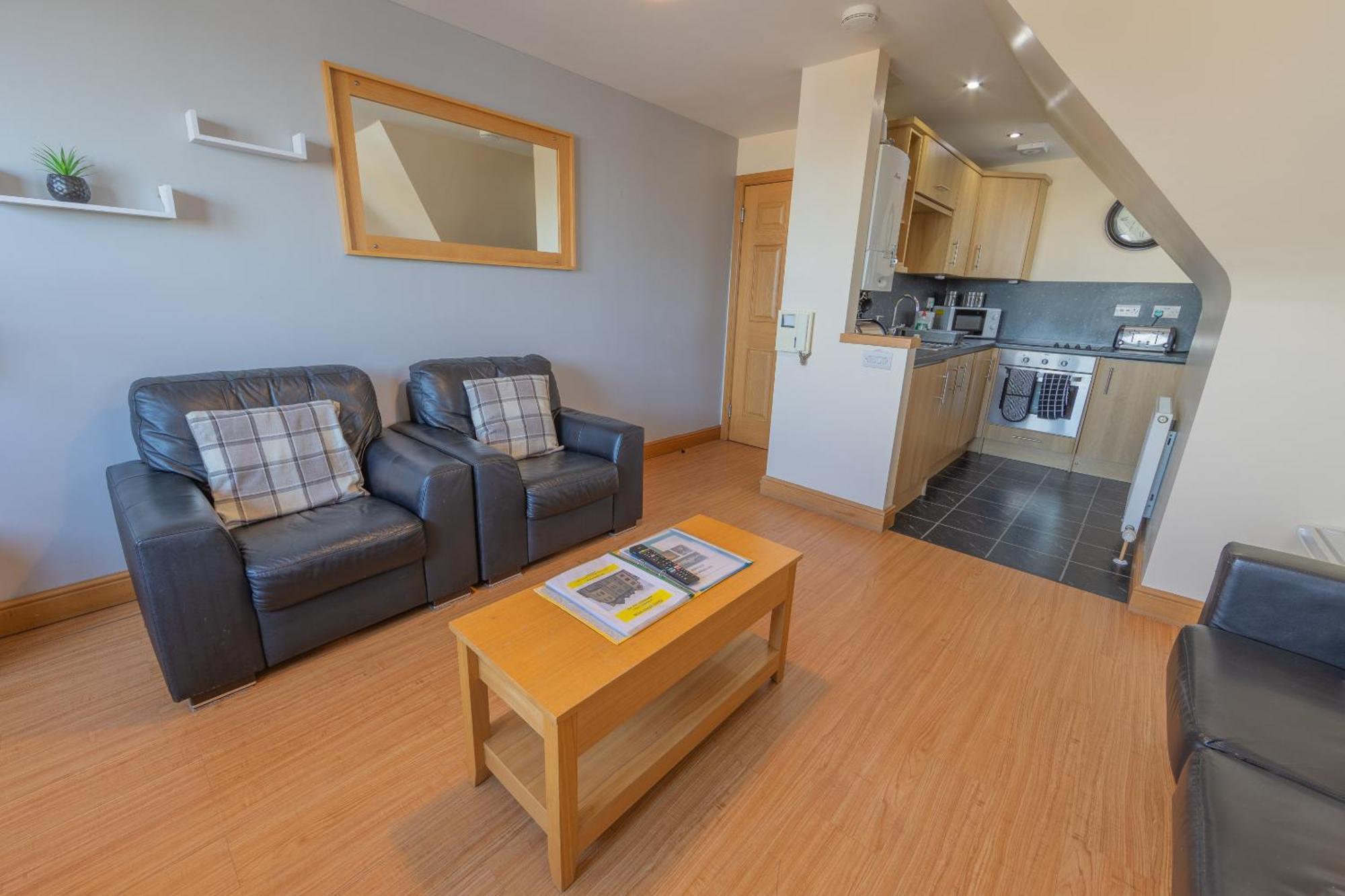 Quay Head View Aparthotel Странрер Стая снимка