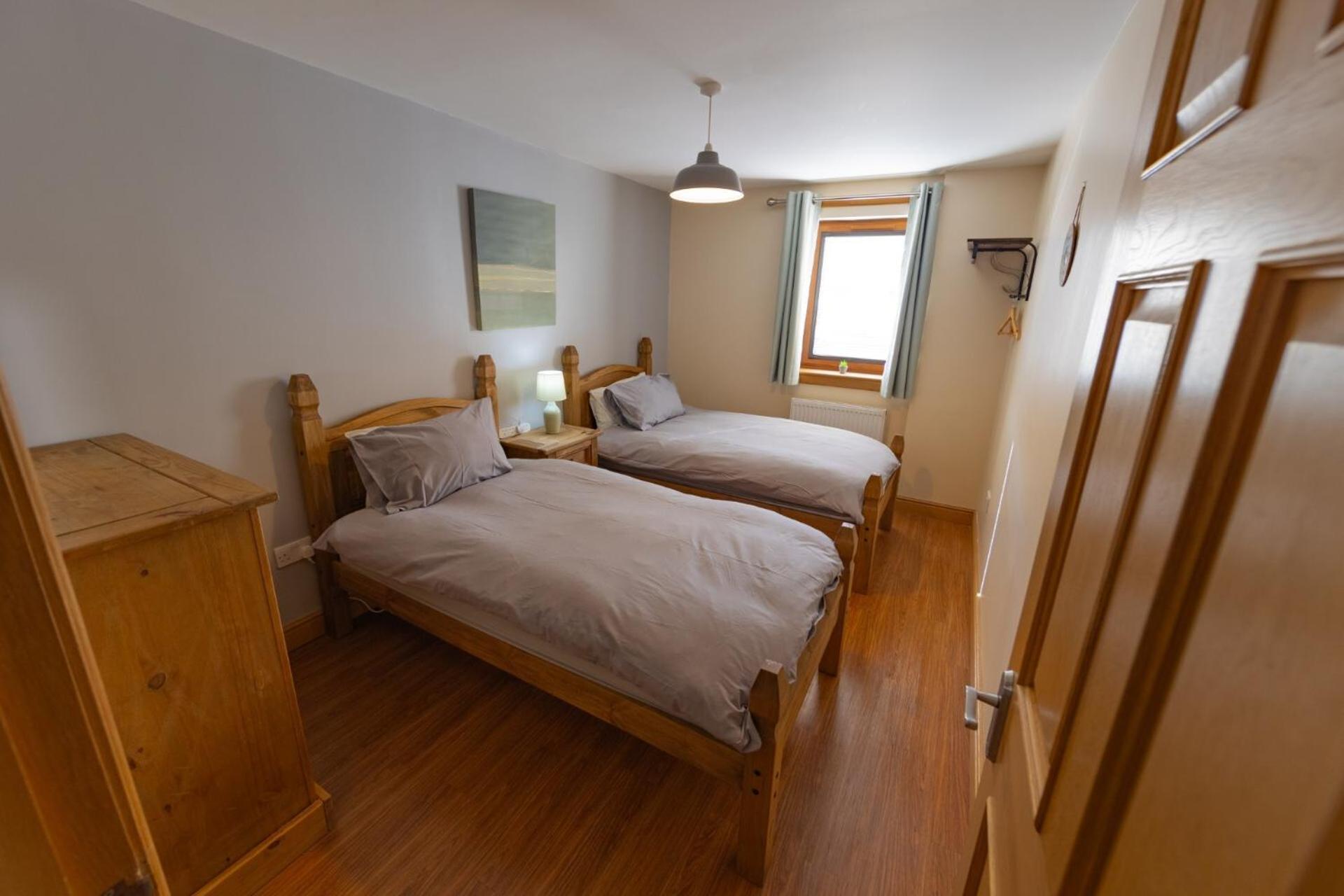 Quay Head View Aparthotel Странрер Стая снимка
