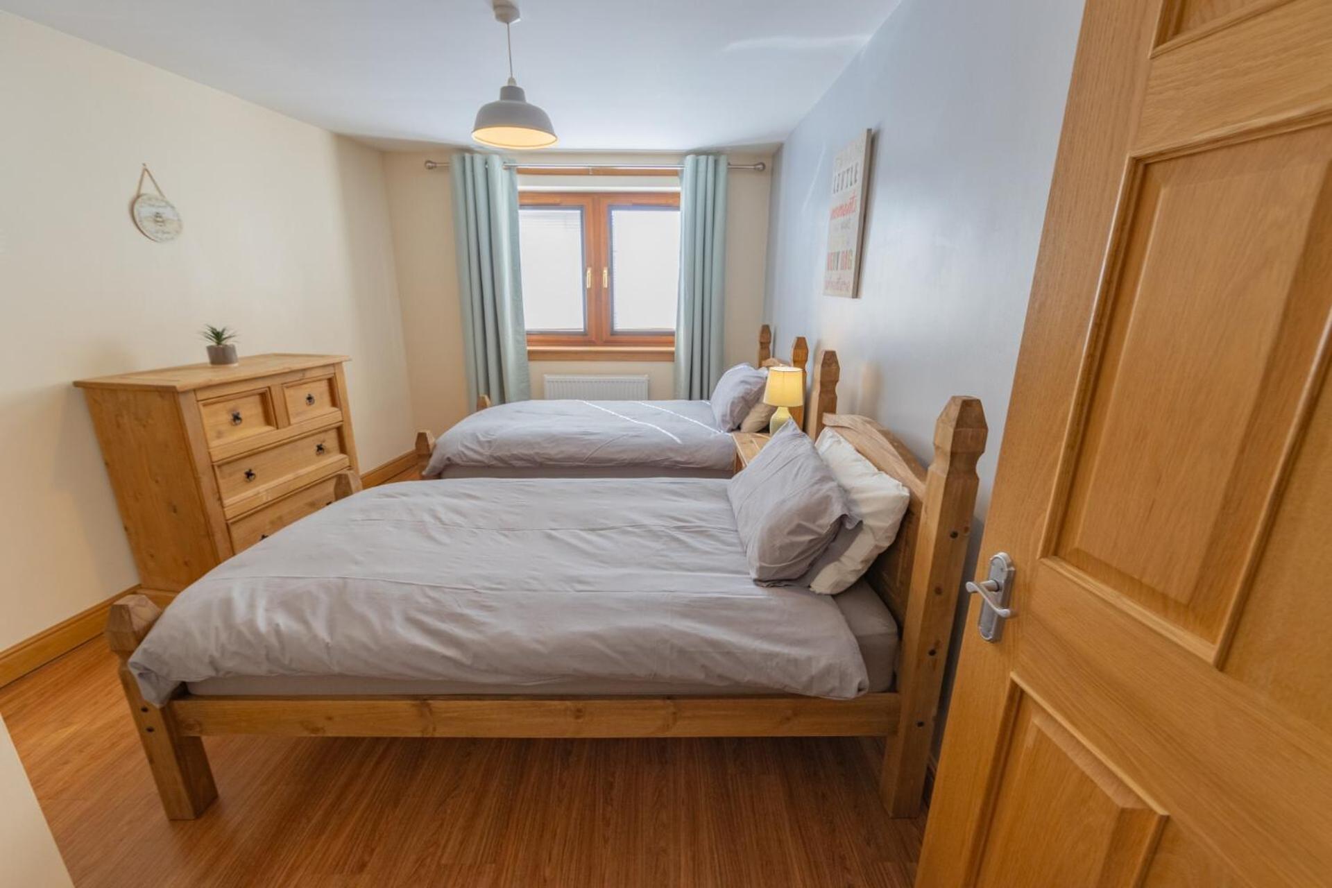 Quay Head View Aparthotel Странрер Стая снимка
